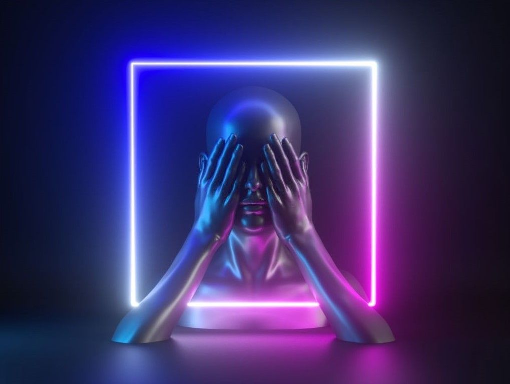 A chrome figure covers its eyes with both hands while seated inside a glowing blue and pink neon square.