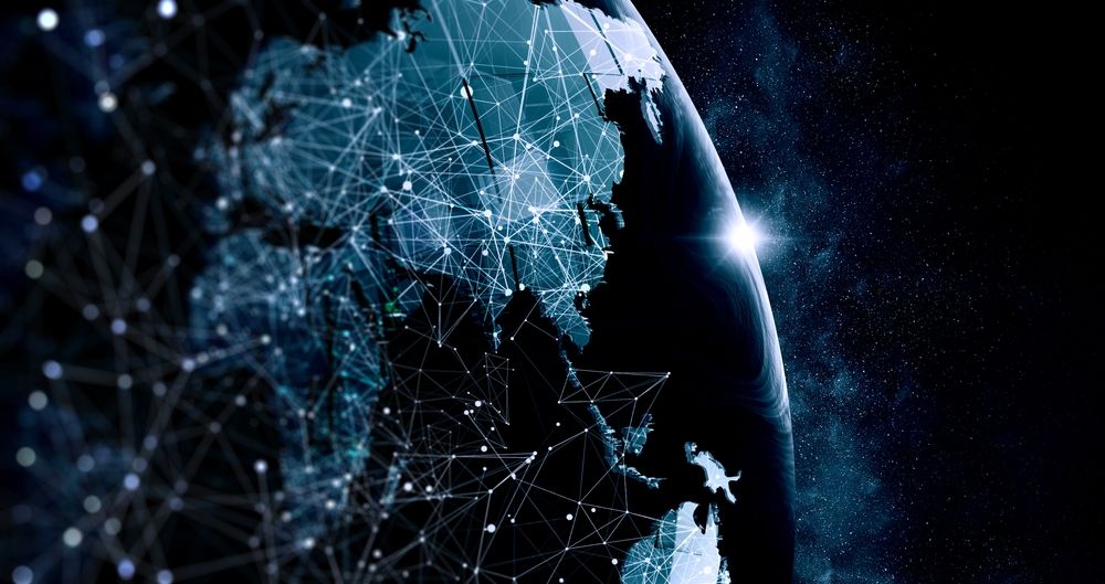 Earth seen from space with its continents covered by a glowing web of linked points.