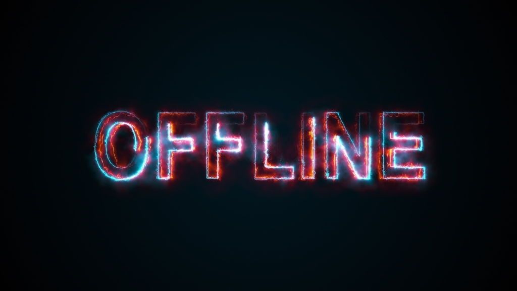 The word OFFLINE burning in red and blue outlines against a black background.