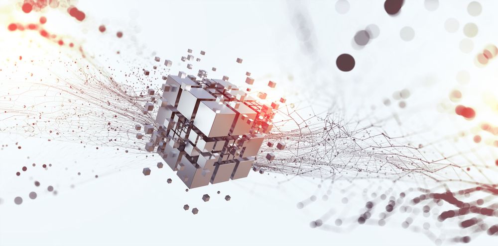 Metallic cube breaking apart into smaller blocks and particle trails on a white background.